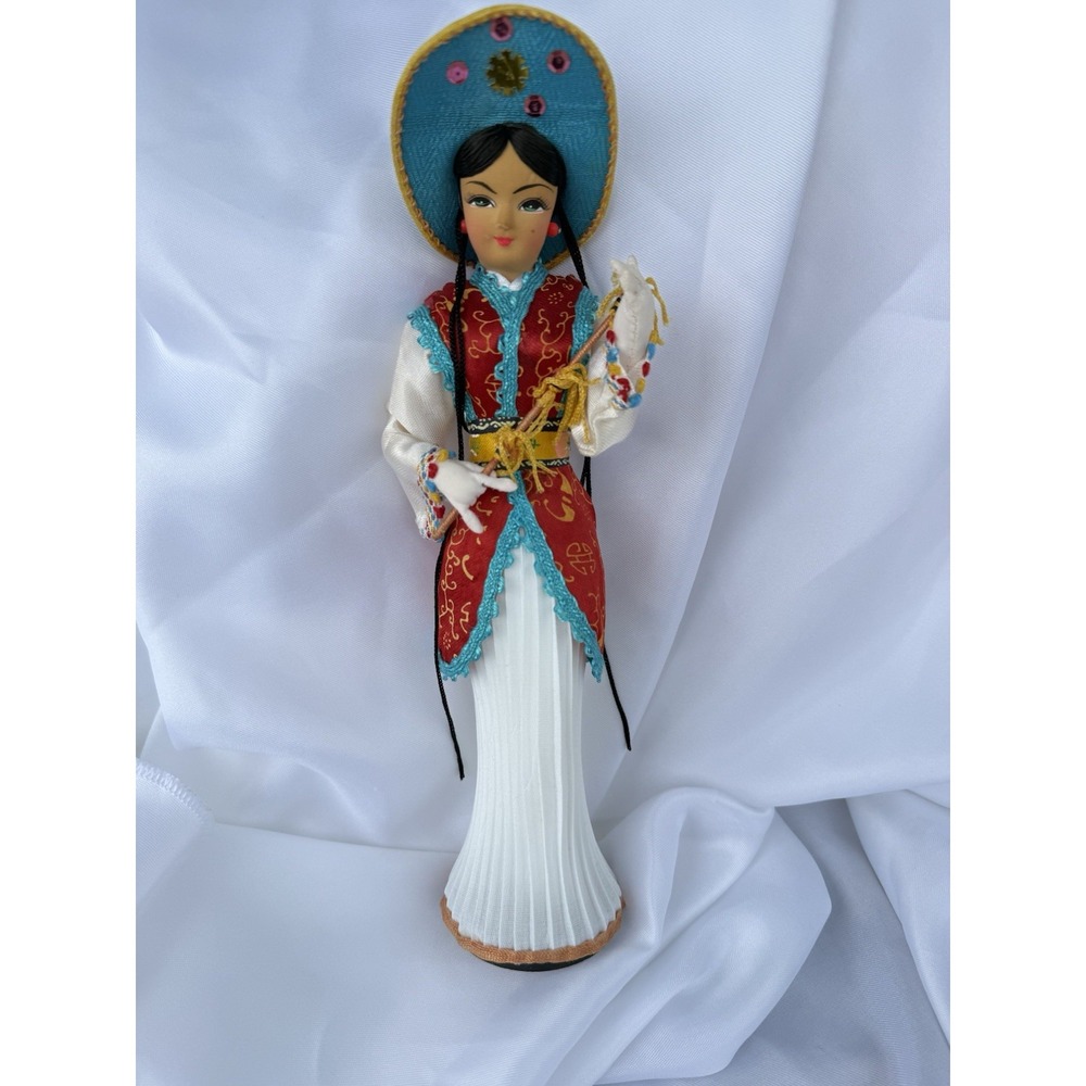 Vintage Chinese Doll Wearing A Beautiful Colorful Traditional Dress